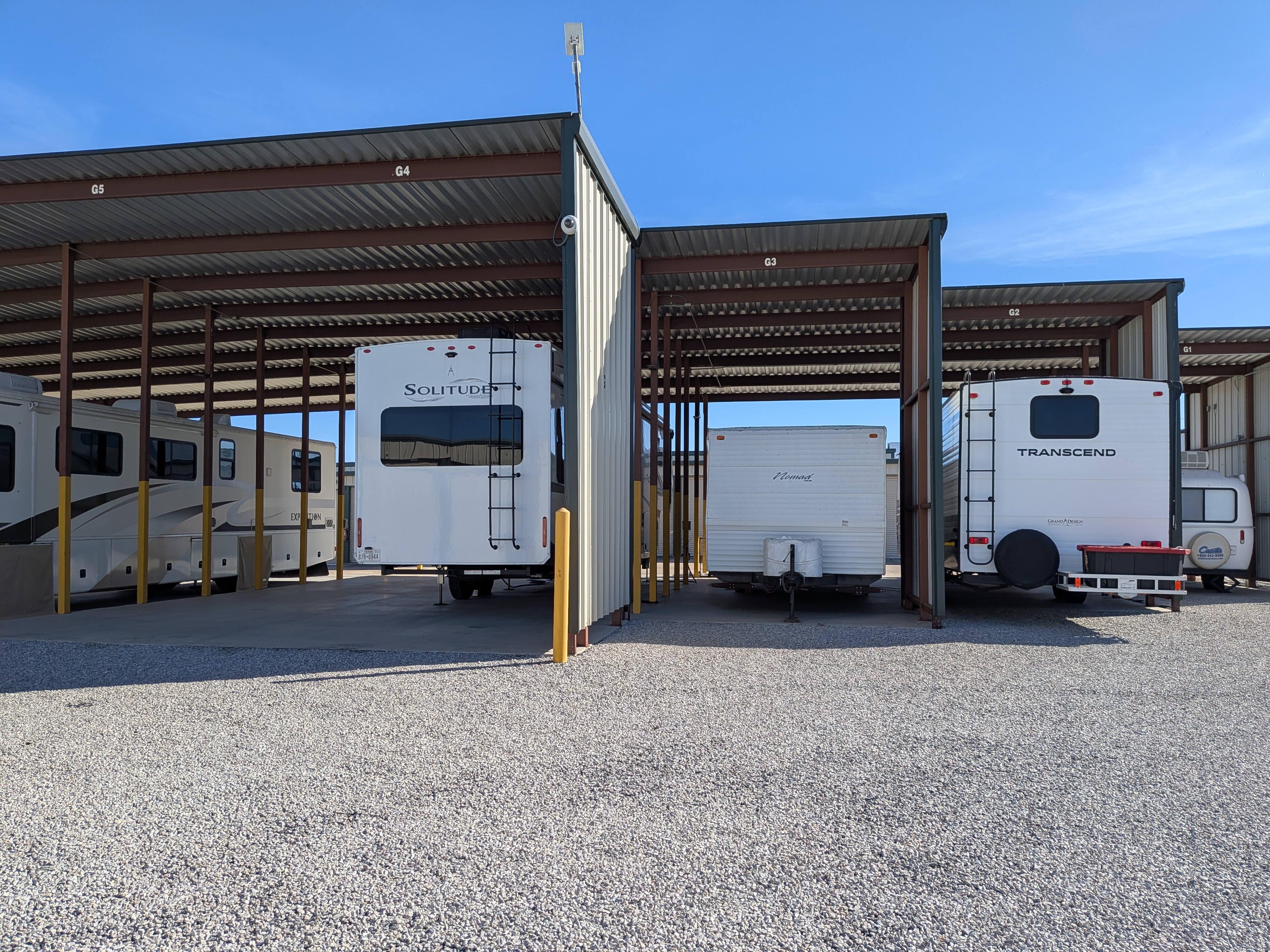 Gated outdoor vehicle storage lot near Round Rock, TX, for RVs, boats, and trailers with HOA restrictions